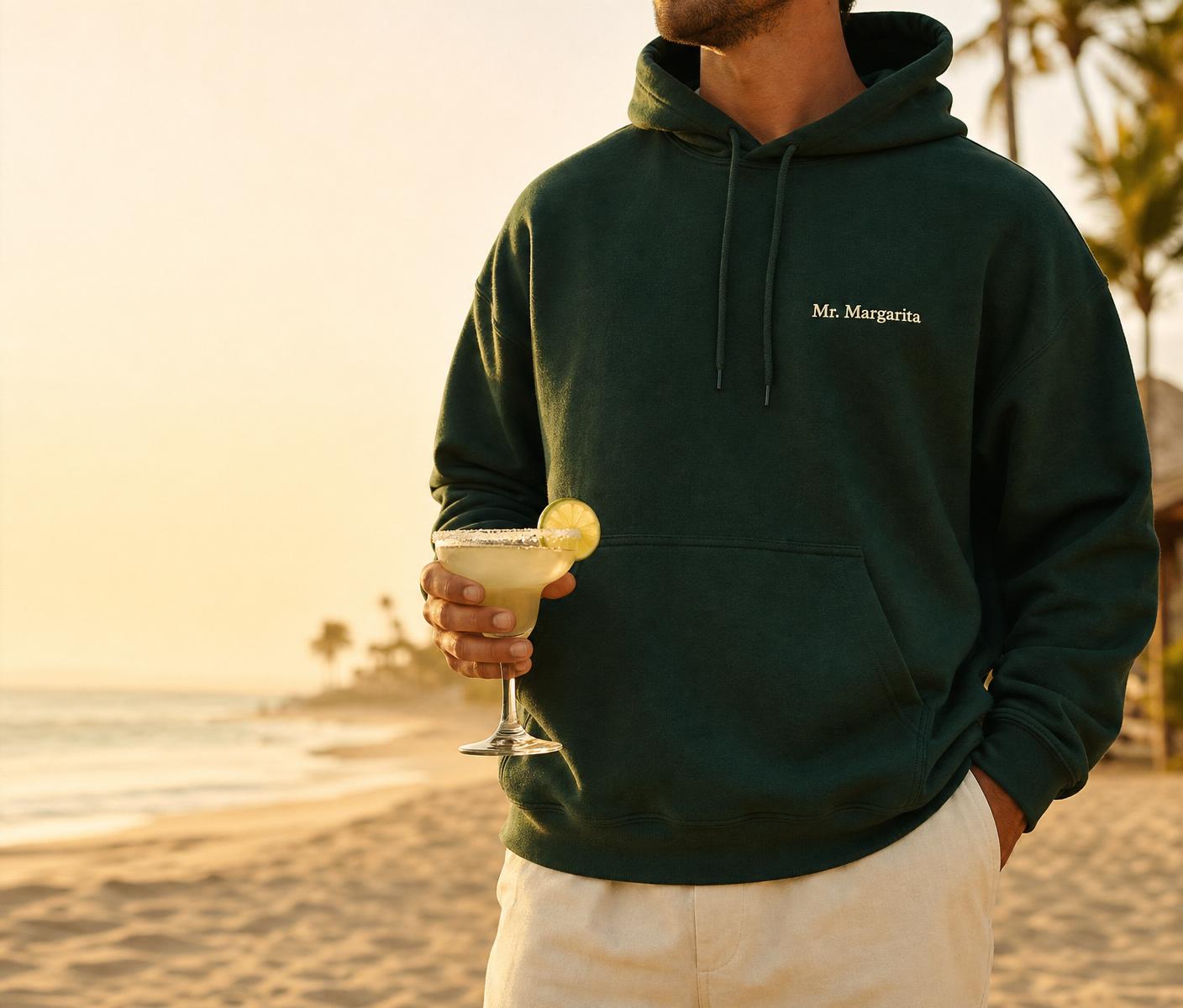 Mr. Margarita forest hoodie on a Baja beach at golden hour